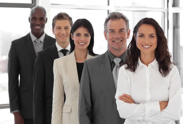 Businesspeople from different cultures looking at camera — Stock Photo, Image