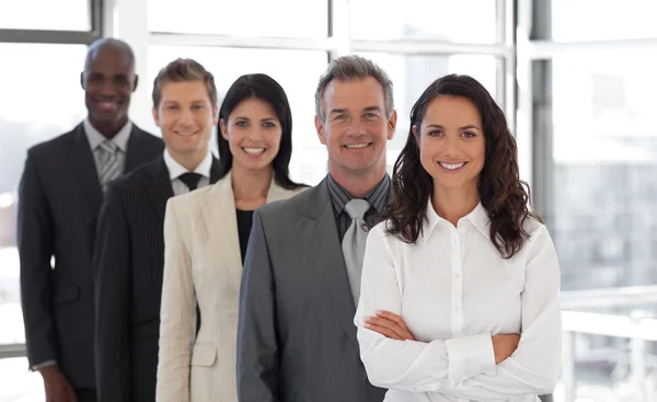 Hispanic Business woman leading a team of workers — Stock Photo, Image