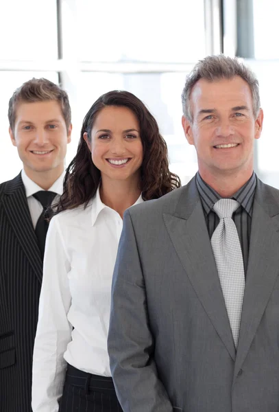 Senior business man leading a group — Stock Photo, Image