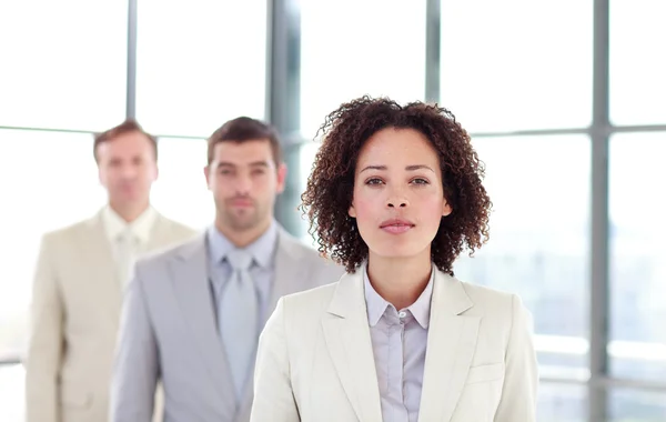 Serious businesswoman in a line — Stock Photo, Image