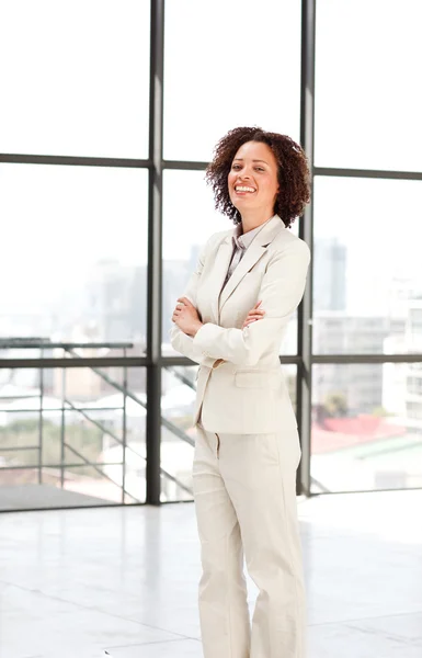Attractive businesswoman with folded arms — Stock Photo, Image