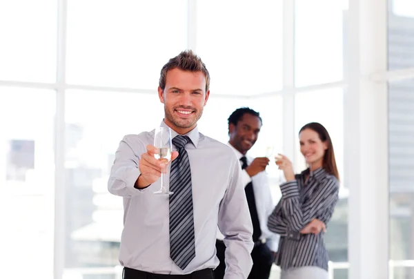 Business drinking champgne in the office — Stock Photo, Image