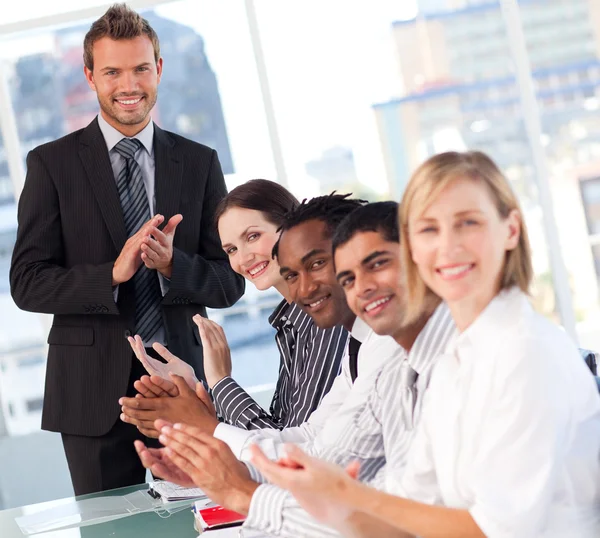 Happy businessteam after a presentation — Stock Photo, Image