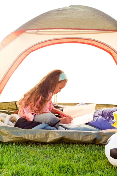 Young girl in tent — Stock Photo, Image