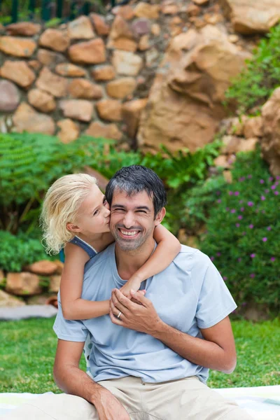 Father giving daughter piggyback — Stock Photo, Image