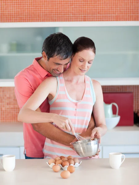 Attractive couple cooking together — Stock Photo, Image