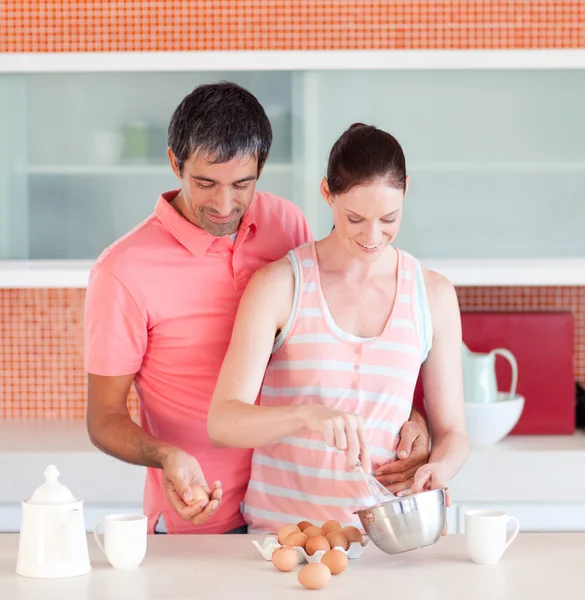 Attractive lovers cooking at home — Stock Photo, Image