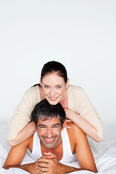 Happy couple in bed with copyspace — Stock Photo, Image