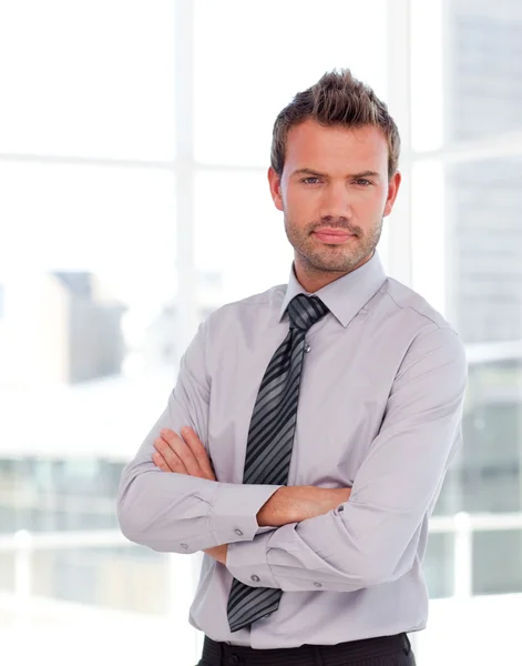 Serious businessman with folded arms — Stock Photo, Image