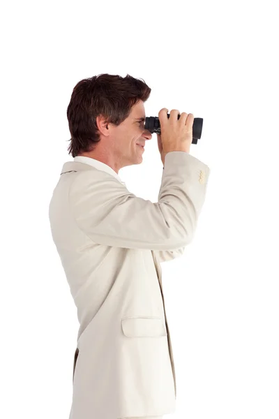 Homem de negócios radiante usando binóculos — Fotografia de Stock