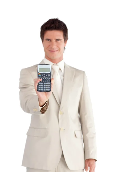 Hombre de negocios alegre sosteniendo una calculadora —  Fotos de Stock