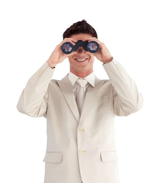 Confident businessman with binoculars — Stock Photo, Image