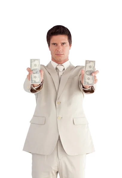 Gioioso uomo d'affari che mostra dollari — Foto Stock