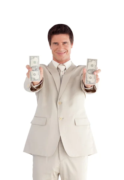 Joyful businessman showing dollars — Stock Photo, Image