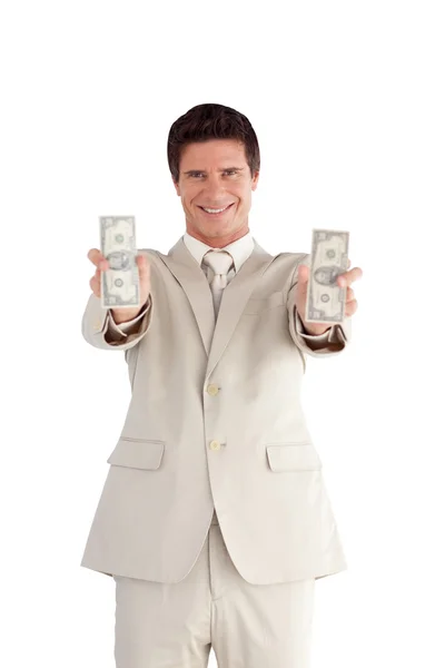Hombre de negocios alegre mostrando dólares —  Fotos de Stock
