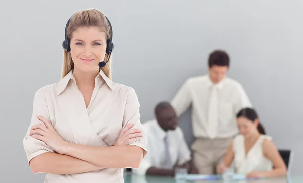 stock image Portrait of businesswoman standing with her collegues