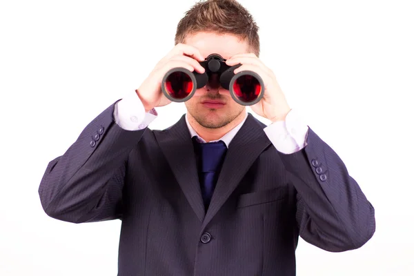Man kijkt door een verrekijker — Stockfoto