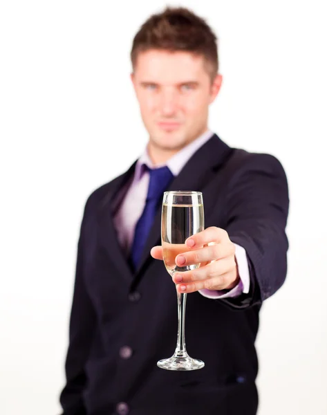 Businessman holding a champagne glass — Stock Photo, Image