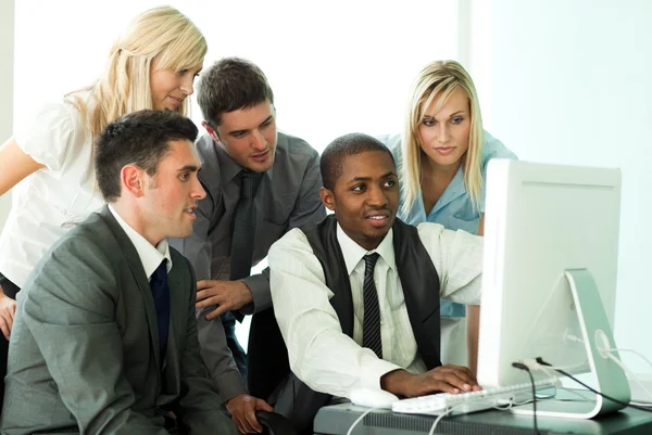 Ethnic business team working in office — Stock Photo, Image