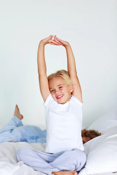 stock image Beautiful daughter stretching after sleeping