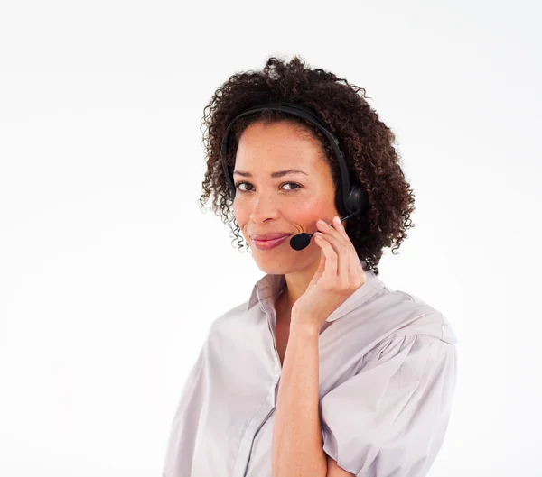 Operadora femenina seria comunicándose en auriculares —  Fotos de Stock