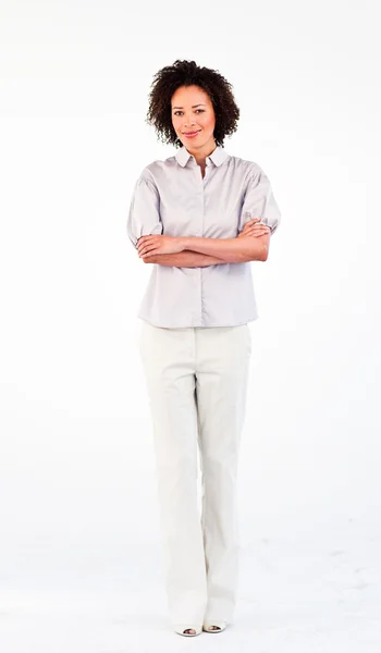 Friendly businesswoman with crossed arms in front of the camera — Stock Photo, Image