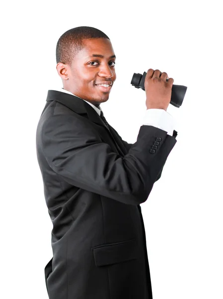 Friendly businessman holding binoculars — Stock Photo, Image