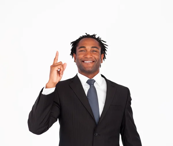 Empresário afro-americano apontando para cima — Fotografia de Stock