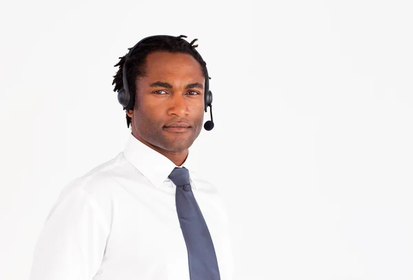 Serious businessman with headset — Stock Photo, Image
