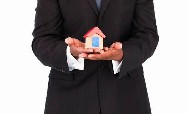 Businessman offering house — Stock Photo, Image
