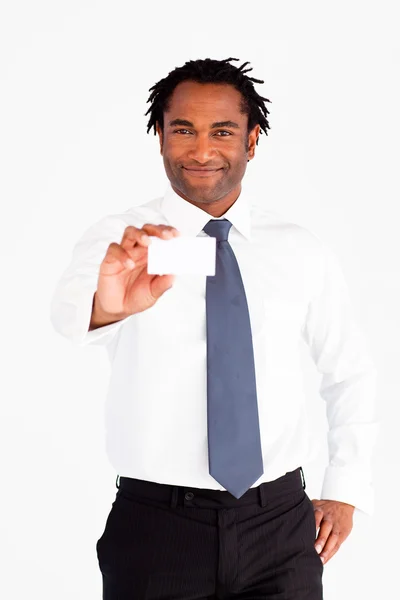Handsome businessman showing white card — Stock Photo, Image