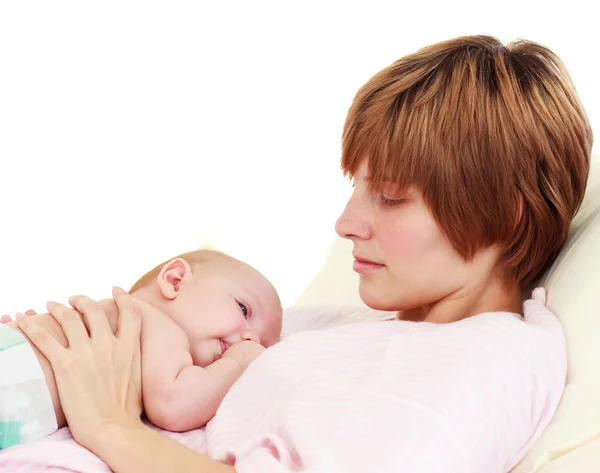 Mother looking at her newborn baby — Stock Photo, Image