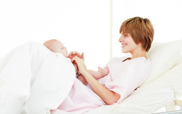 Mother playing with her baby son — Stock Photo, Image