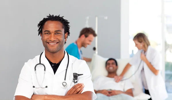 African doctor smiling at the camera — Stock Photo, Image