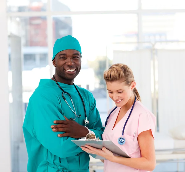 Surgeon and nurse in hospital — Stock Photo, Image