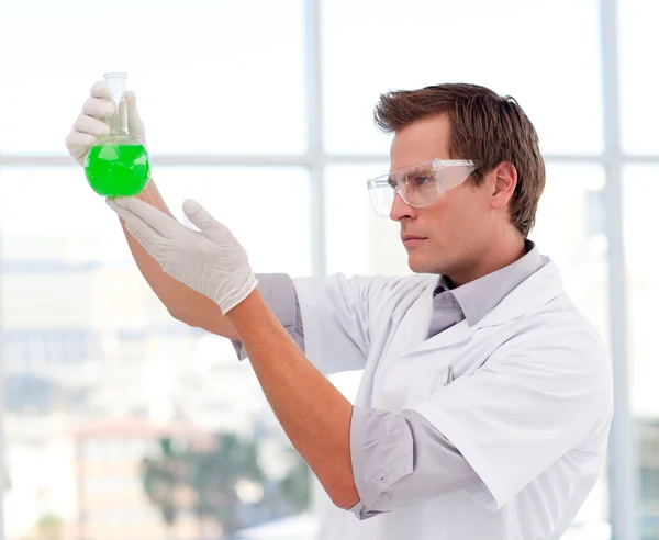 Science student examining a test-tube — Stock Photo, Image
