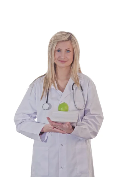 Kobieta lekarz trzyma jabłko — Zdjęcie stockowe