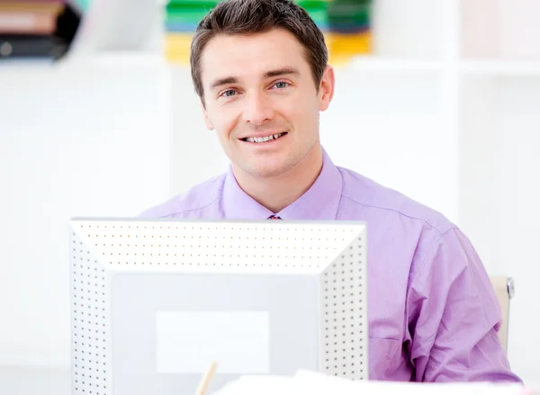 Serious businessman working at a computer — Stock Photo, Image