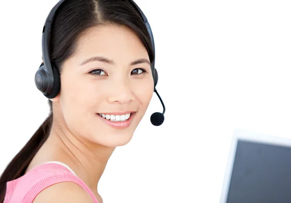 Smiling businesswoman with headset on — Stock Photo, Image