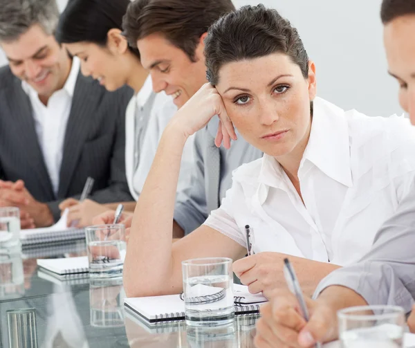 Bored businesswoman at a presentation — Stock Photo, Image