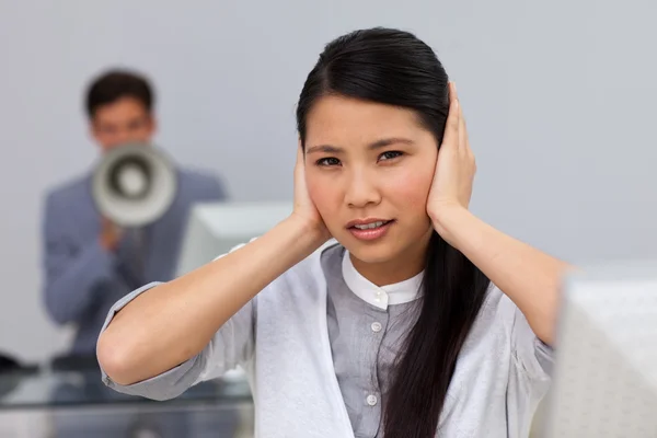 Stock image Businesswoman covering her ears