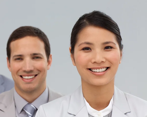 Close-up of two international co-workers — Stock Photo, Image