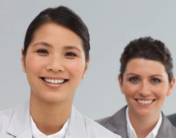 Smiling Business co-workers standing in a line — Stock Photo, Image
