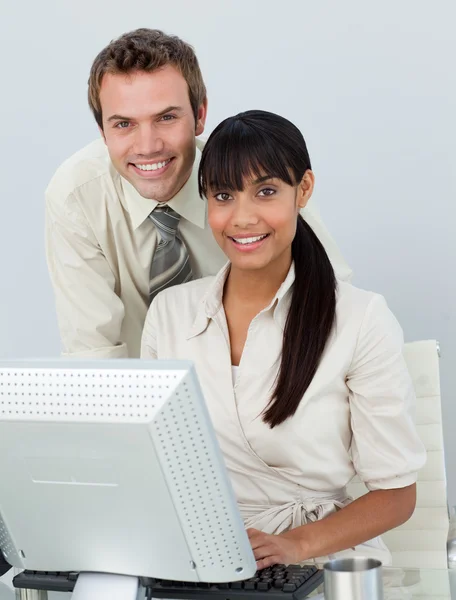 Business colleagues using a laptop — Stock Photo, Image