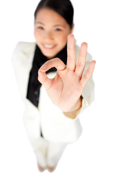 Confident businesswoman showing OK sign — Stock Photo, Image