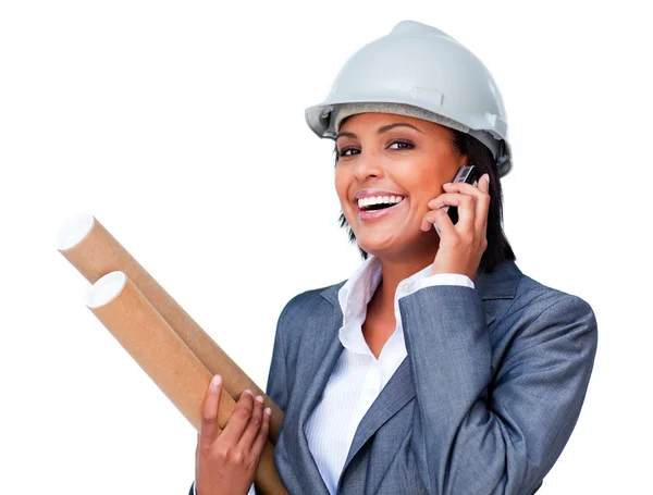 Female architect on phone bringing blueprints — Stock Photo, Image
