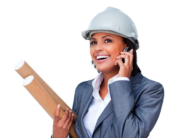 Smiling architect on phone wearing a hardhat — Stock Photo, Image