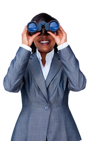 Young hispanic businesswoman using binoculars — Stock Photo, Image