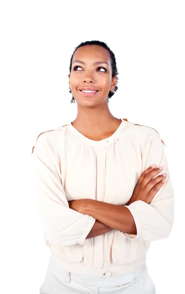 Beautiful businesswoman with folded arms looking up — Stock Photo, Image