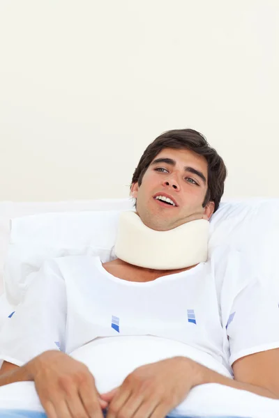 Young patient with a neck brace — Stock Photo, Image